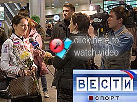 Chess Grandmaster Alexandra Kosteniuk is featured on TV at her arrival at Moscow Airport after her success in Crete at the European Team Championshps